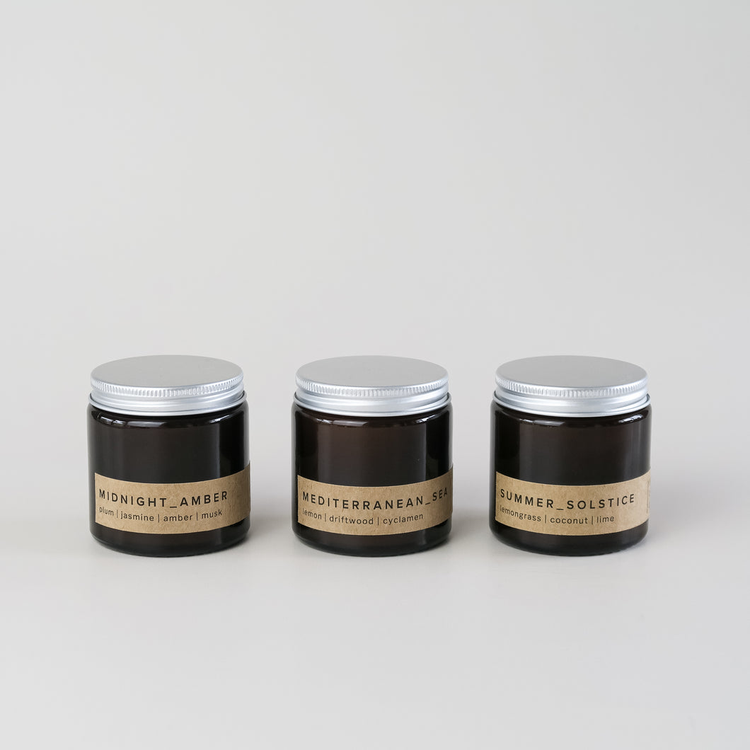 gift set of three small amber jar candles with aluminium lid and minimal brown labels, in bestselling fragrances